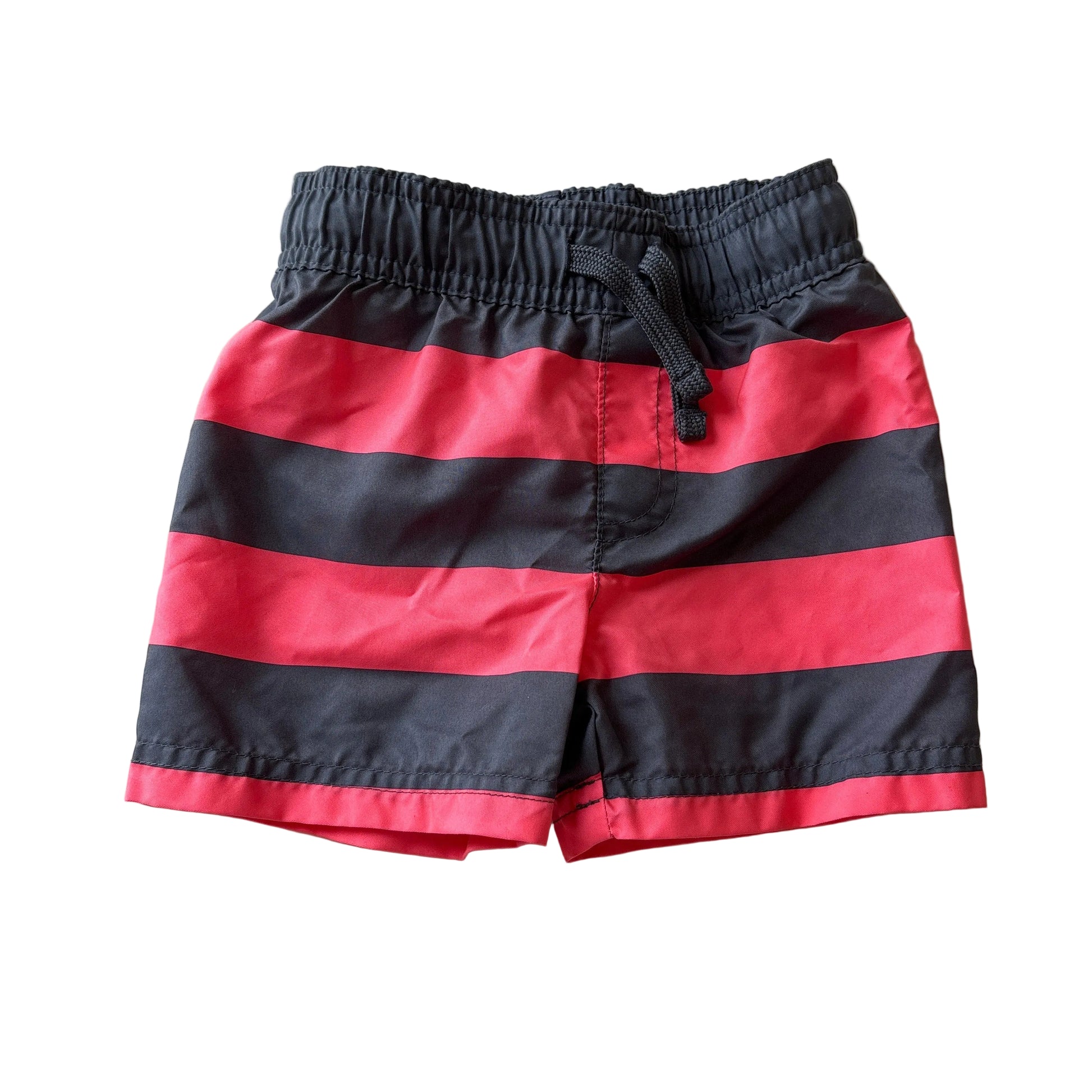 Red and black striped shorts on a white background
