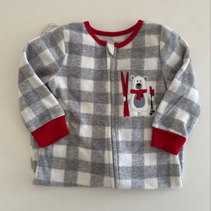 Children's checkered pajama top with a bear design on a light beige background