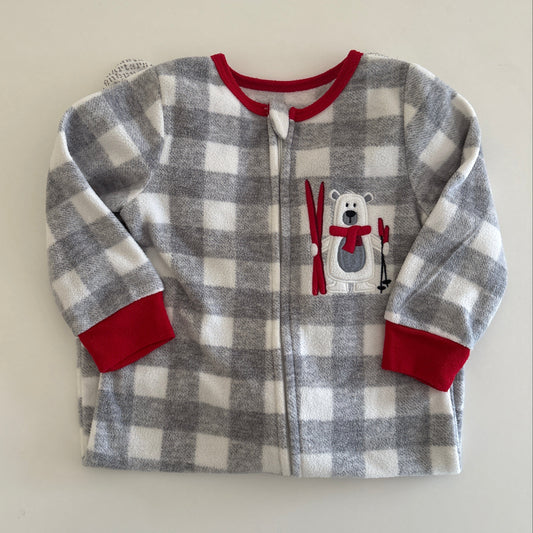 Children's checkered pajama top with a bear design on a light beige background