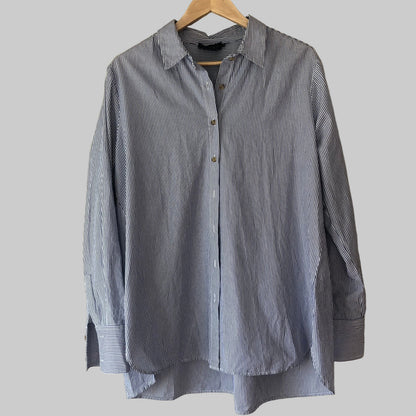 Navy and white microstripe classic button down shirt on a hanger