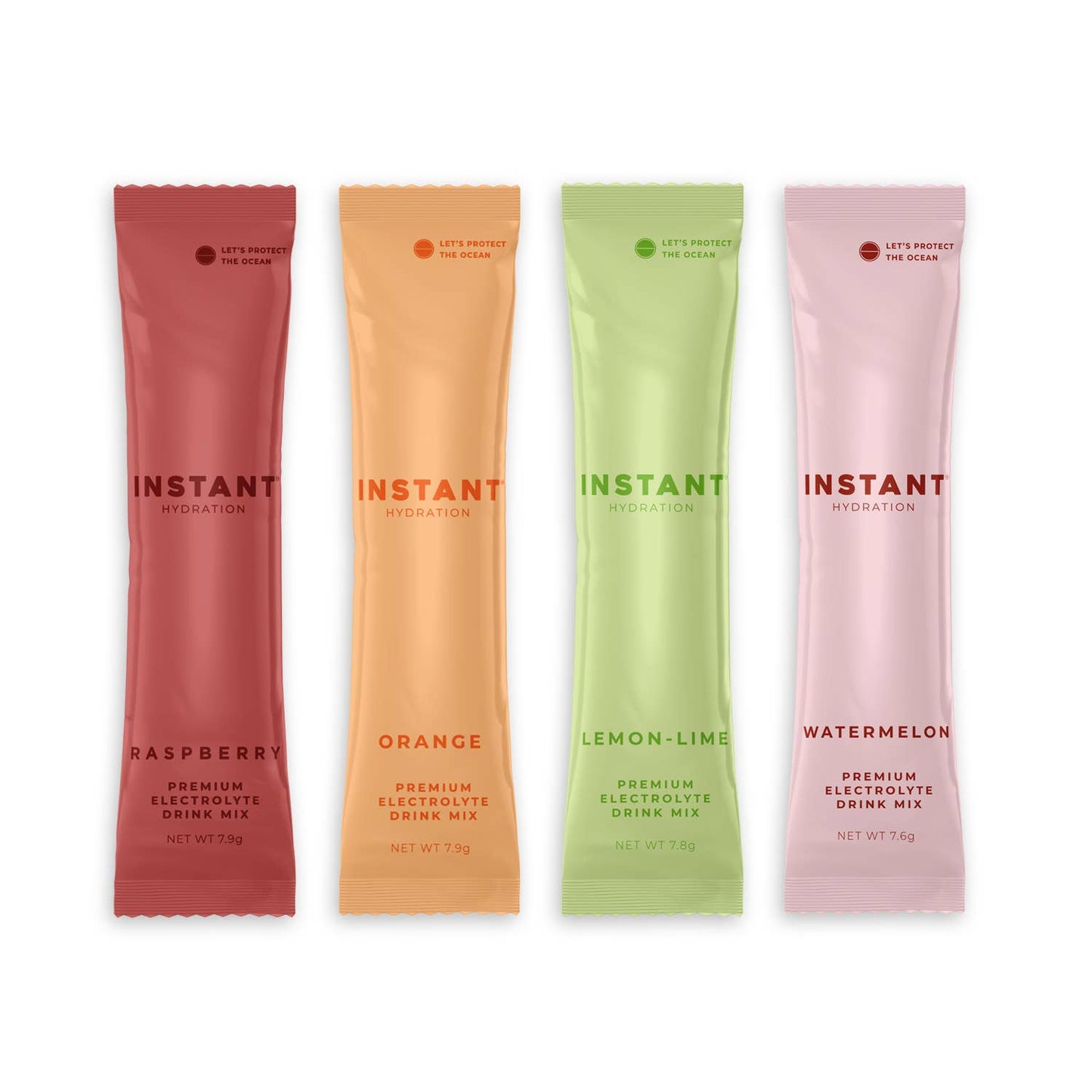 Four instant drink mix packets in different flavors on a white background