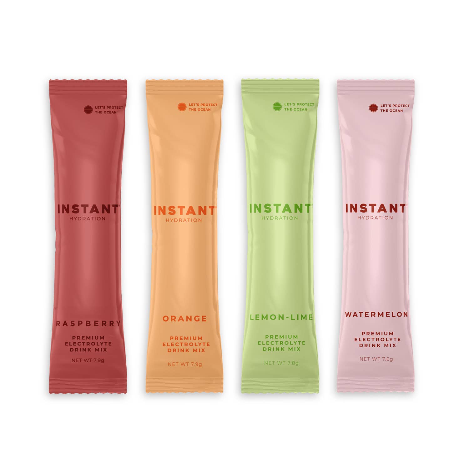 Four instant drink mix packets in different flavors on a white background