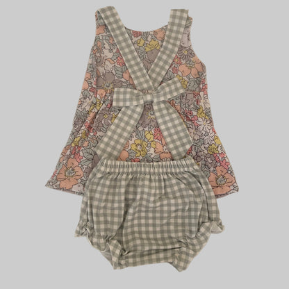 Floral top and checkered bloomers set on a beige background
