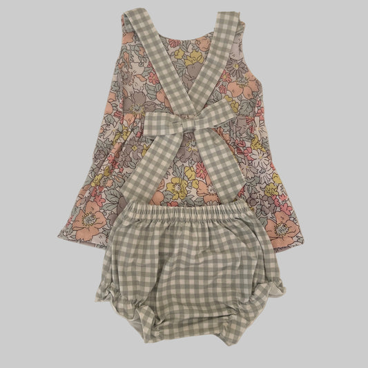 Floral top and checkered bloomers set on a beige background