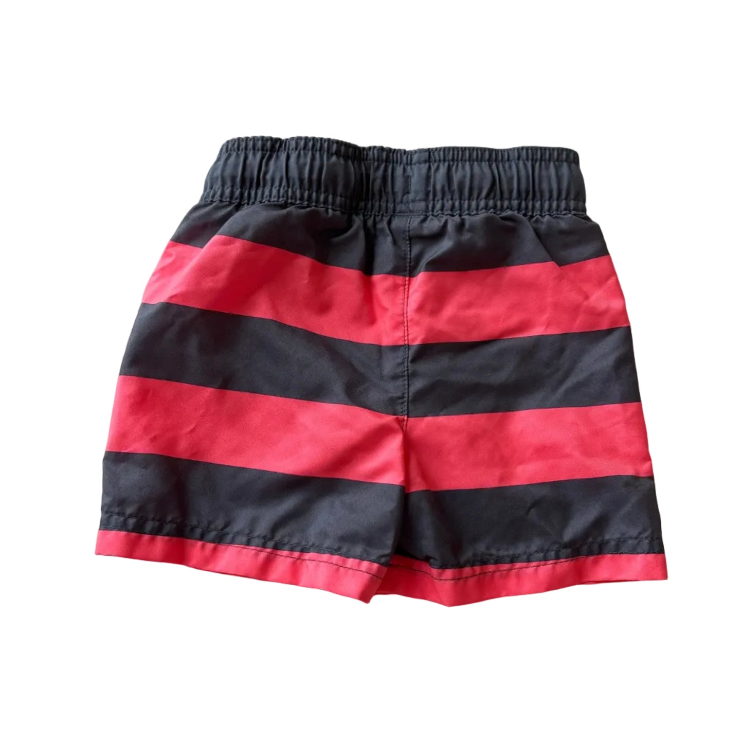 Red and black striped shorts on a white background