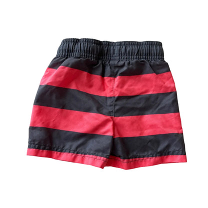 Red and black striped shorts on a white background