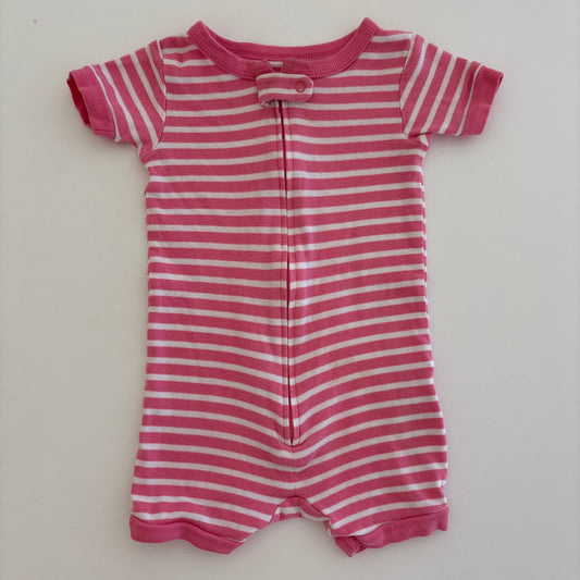 Pink and white striped baby romper on a light gray background