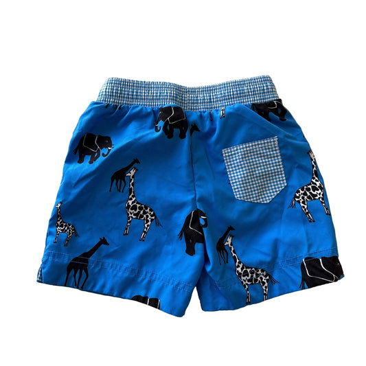 Blue children's swim shorts with black animal print on a white background