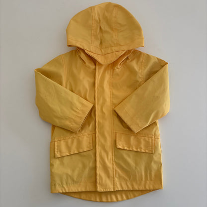 Yellow raincoat on a white background