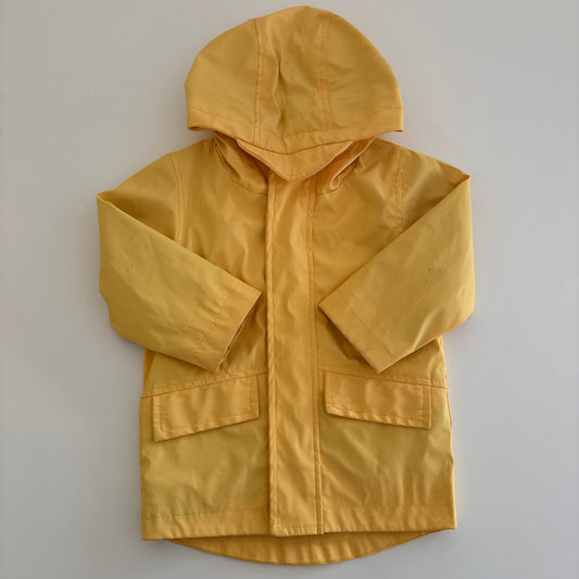 Yellow raincoat on a white background
