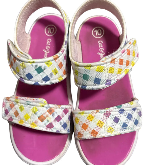 A pair of Cat & Jack toddler sandals in size 10 with a rainbow pattern. The sandals are pre-loved and show signs of wear.