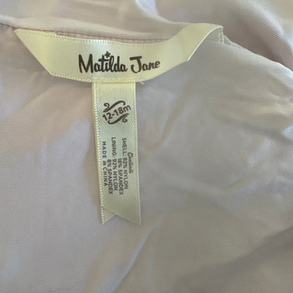 Close-up of a label on a garment with 'Matilda Jane' branding.