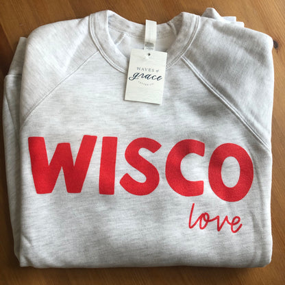 Light gray crewneck sweatshirt with red writing that says Wisco Love